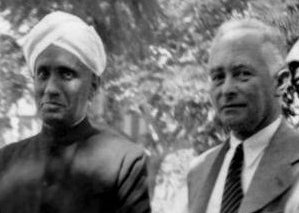 Quantum pioneer Max Born in Bangalore, India, at the invitation of fellow Nobel Laureate Chandrasekhara Venkata Raman (left). Born (center) delivered a lecture about the 'mysterious number 137' the approximate inverse of the fine structure constant.