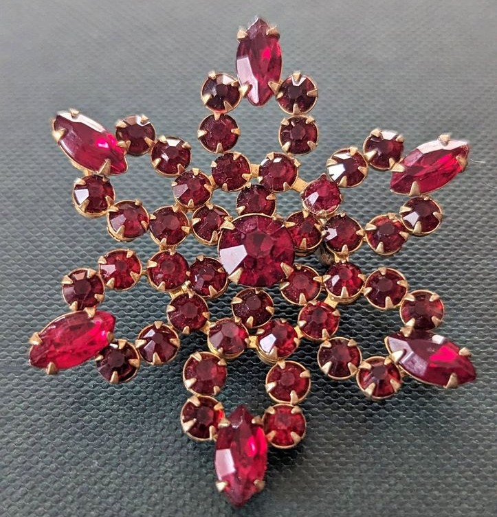 Tomorrow is Mothers Day!  It's never too late to get mom something special.  Check out one of our brooches - The Garnet Flower Brooch! #mothersday #mom #specialgift #brooch gainesvillethings.com/product/garnet…