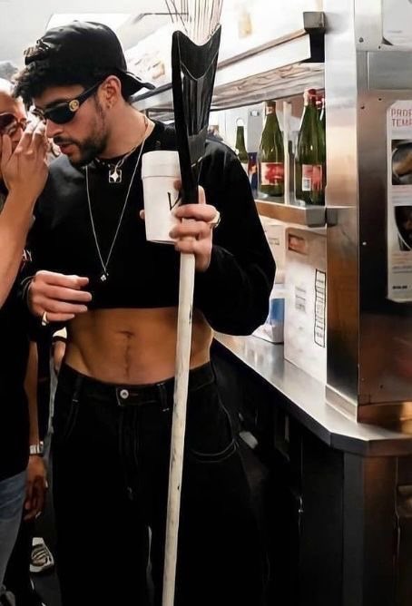 bad bunny wearing a crop top