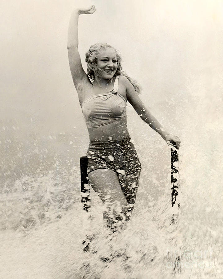 No famous bubble or ostrich-feather fans - just a joyous Sally Rand frolicking in ocean waves..............