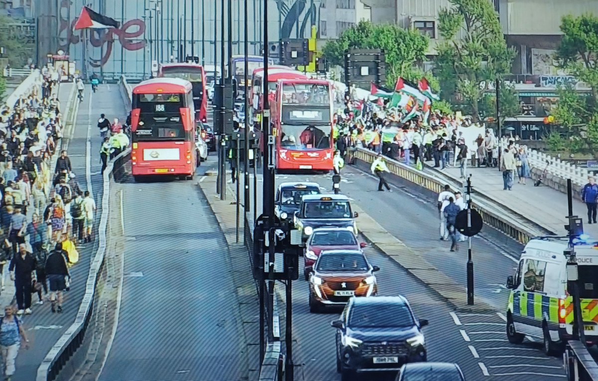 Waterloo Bridge is open to traffic with protesters on the pavement. A group of protesters briefly disrupted traffic after leaving Jubilee Gardens. Conditions were quickly imposed and the road was clear within 13 minutes. Officers remain on the bridge.