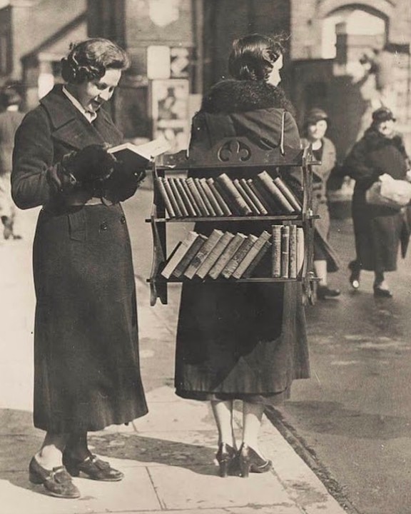A lady walks around London renting out books as a “Walking Library”.