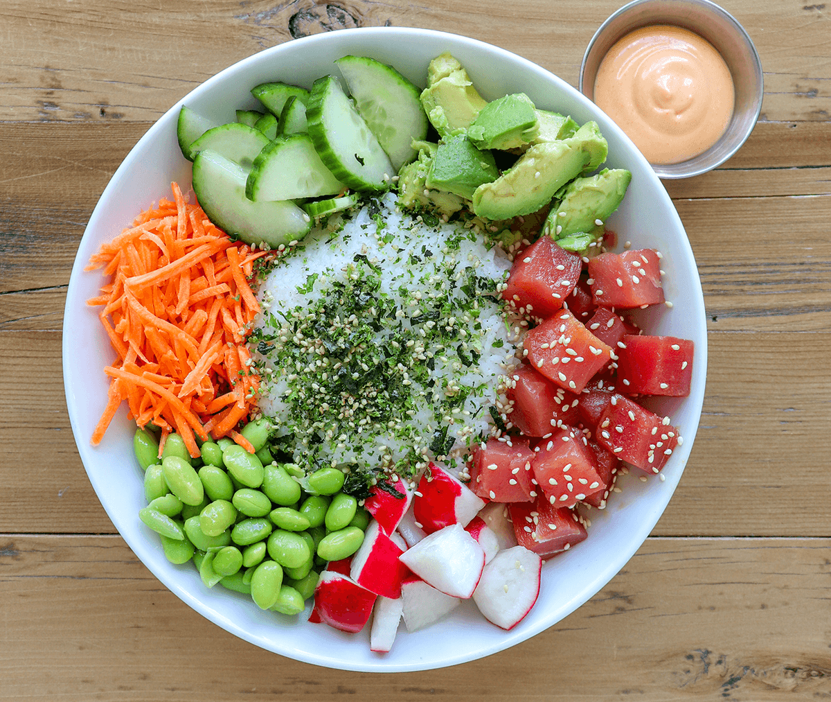 Poke Bowl 🐟
Wild caught tuna dressed in our house marinade, avocado, cucumber, carrots, edamame, radish, toasted sesame seeds, spicy vegan mayo, and furikake, served on a bed of jasmine rice. 

#PokeBowl #HealthyOptions #HealthyLunches #HealthyLifestyle #KaleMeCrazy #HomewoodAL