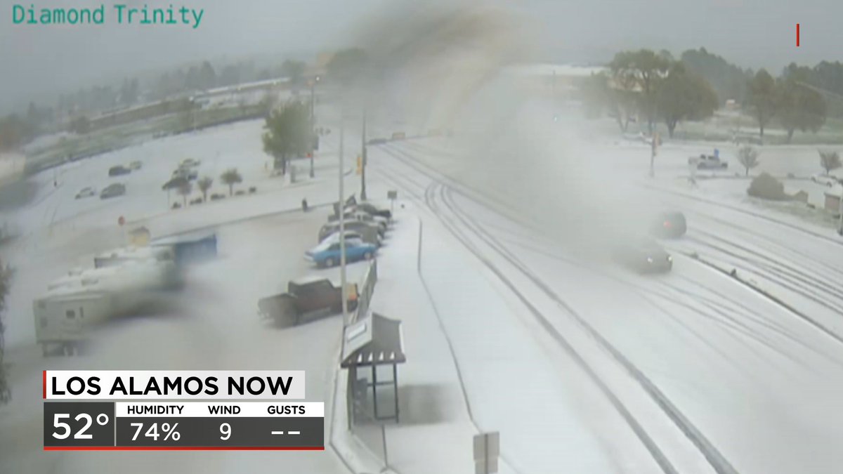 Looks like hail is falling in Los Alamos now... making everything white! @KOB4 #NMwx