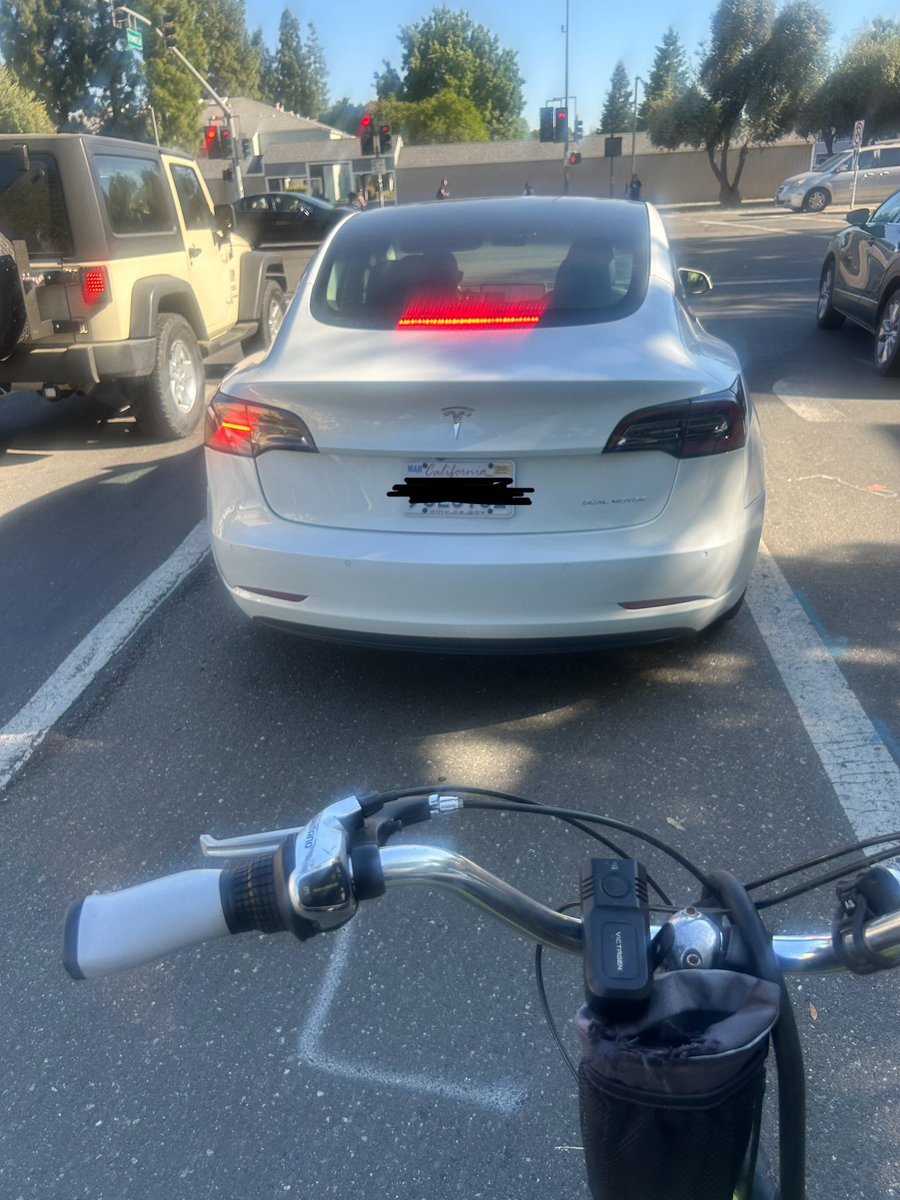 tesla in da bike lane 🥶🥶💯