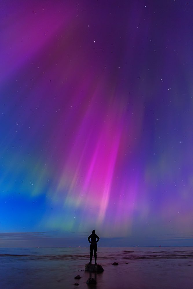 A self portrait under the Aurora curtain. 
The reds were so intense last night.
Open for full image. 
#photography #manitoba #AurorBorealis #auroras