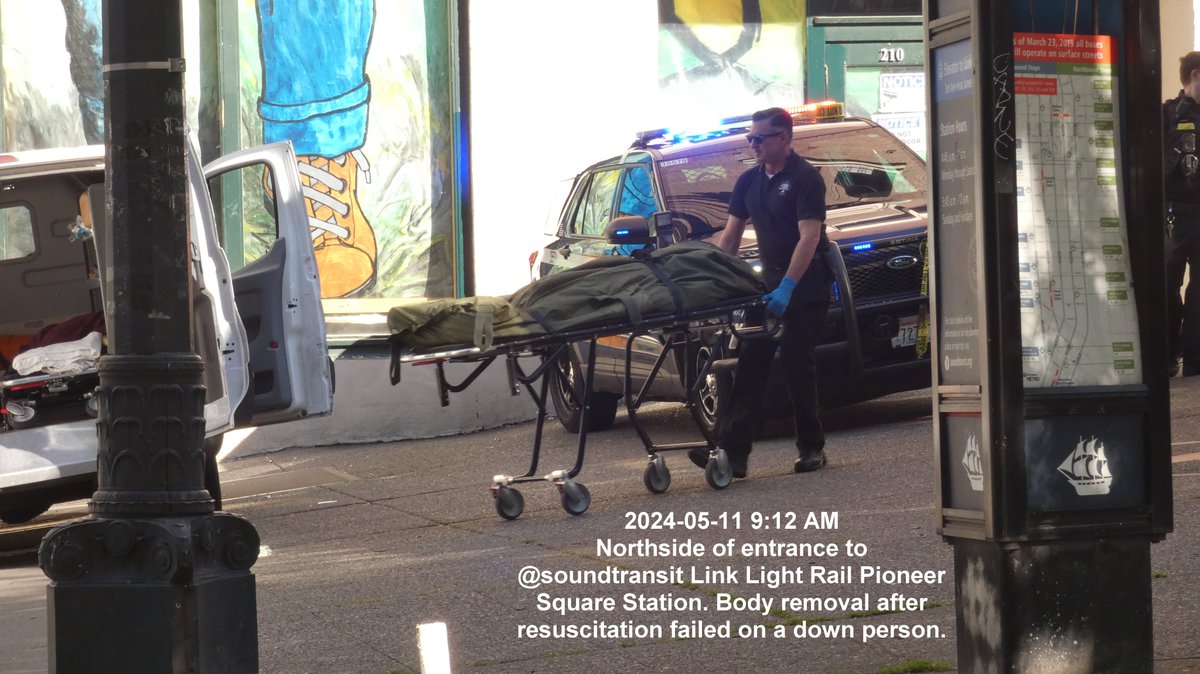 2024-05-11 9:12 AM. Northside of entrance to 
@soundtransit Link Light Rail Pioneer Square Station. Body removal after resuscitation failed on a down person in #Seattle. @SoundTransit @MayorofSeattle @SeattleCouncil @VisitSeattle
