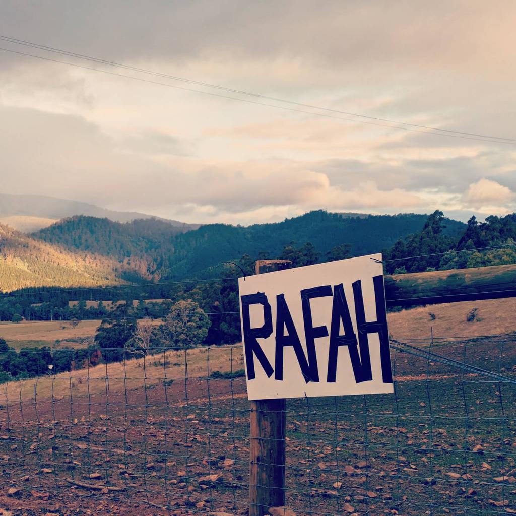 My mother-in-law was born to a Jewish family in the NL, with many in her extended family perishing in Nazi concentration camps. She is devastated by what is being done to the people of Gaza today. This is the sign she made & stuck up on her fence in rural Tassie. Not in her name.