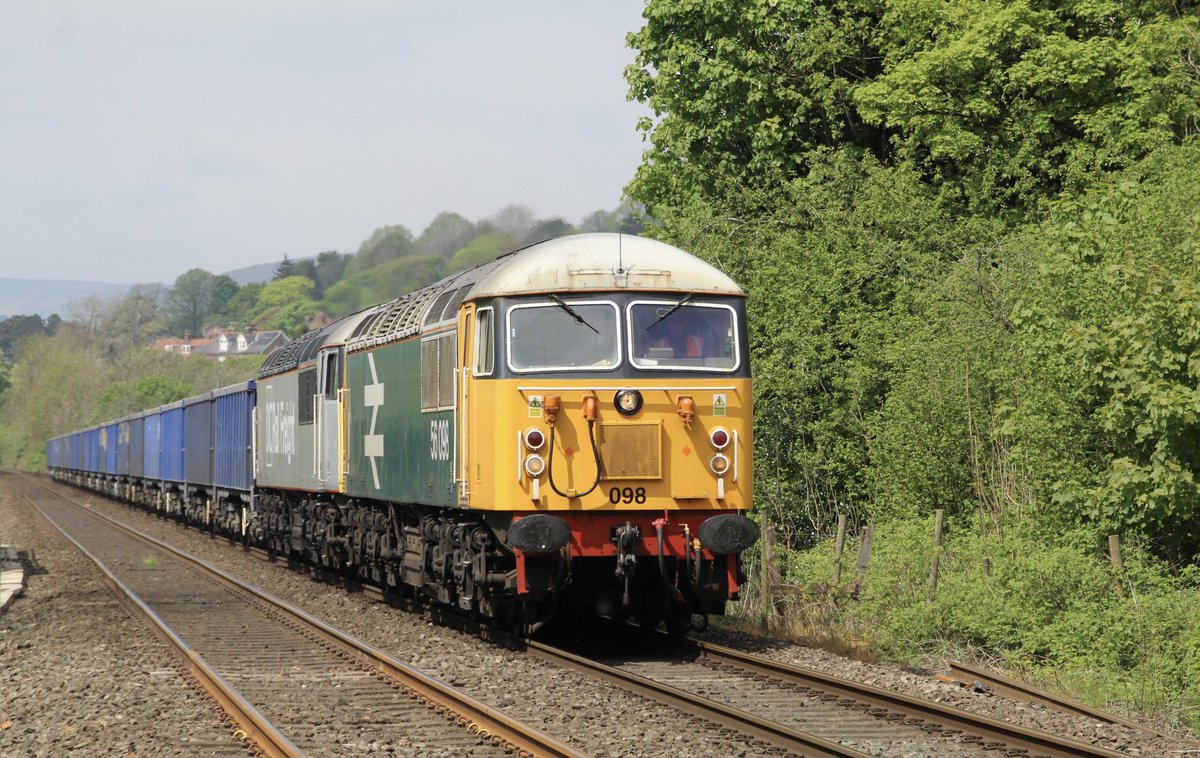 GBRf on hire to DCR class 56 No. 56098 with her large logo BR blue livery leads DCR class 56 No. 56103 recently released into traffic through Hathersage as 6Z82 Peak Forest Cemex sidings to Brandon down sidings. 9th May 2024.
