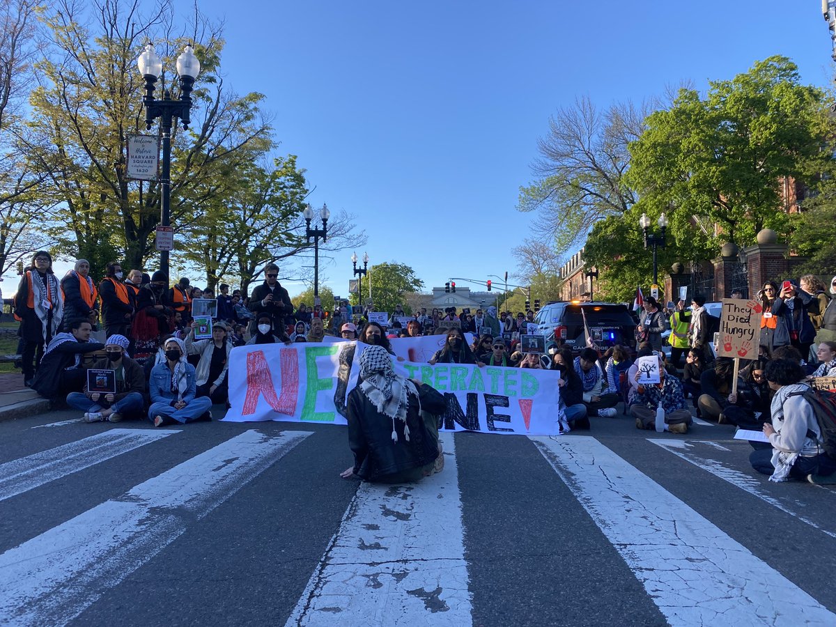 Pro-Palestinian demonstrators have shut down a roadway in Harvard Square.