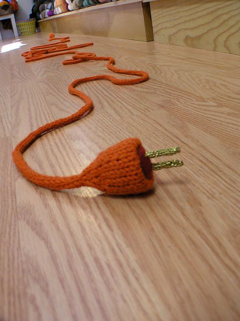 It's a Knitted Orange Extension Cord, You Can Knit One Too! 👉 buff.ly/3ezXZbd #knitting #fiberart