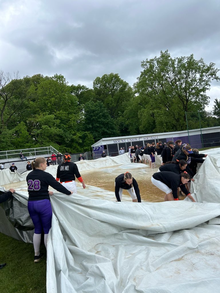 <a href="/OHAthleticConf/">Ohio Athletic Conference</a> <a href="/purpleraiders/">Mount Union Purple Raiders</a> <a href="/UMU_Softball/">University of Mount Union Softball</a> Team effort by all. Including <a href="/ONUSoftball/">ONU Softball</a> for showing MU how to funnel the water off the field!