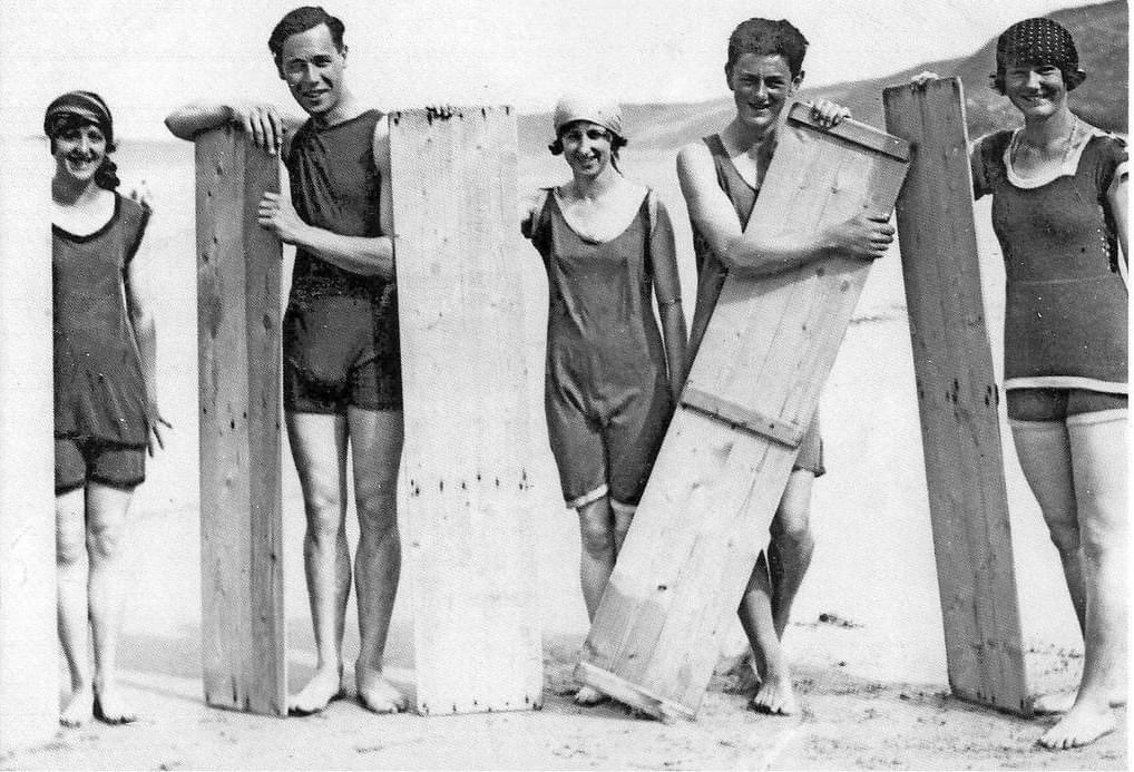 Surfers at Perranporth beach, Cornwall, in 1922.