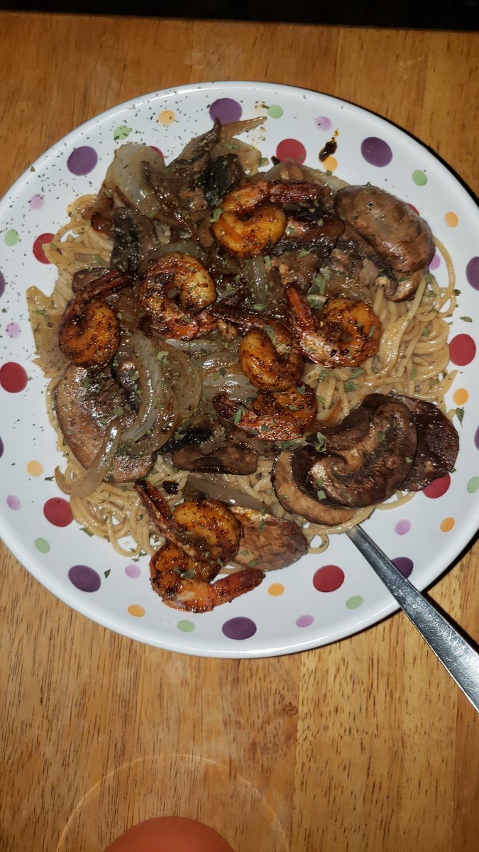 Sweet and spicy chili lime shrimp with mushrooms and onions served over garlic ginger noodles 🍜 😋