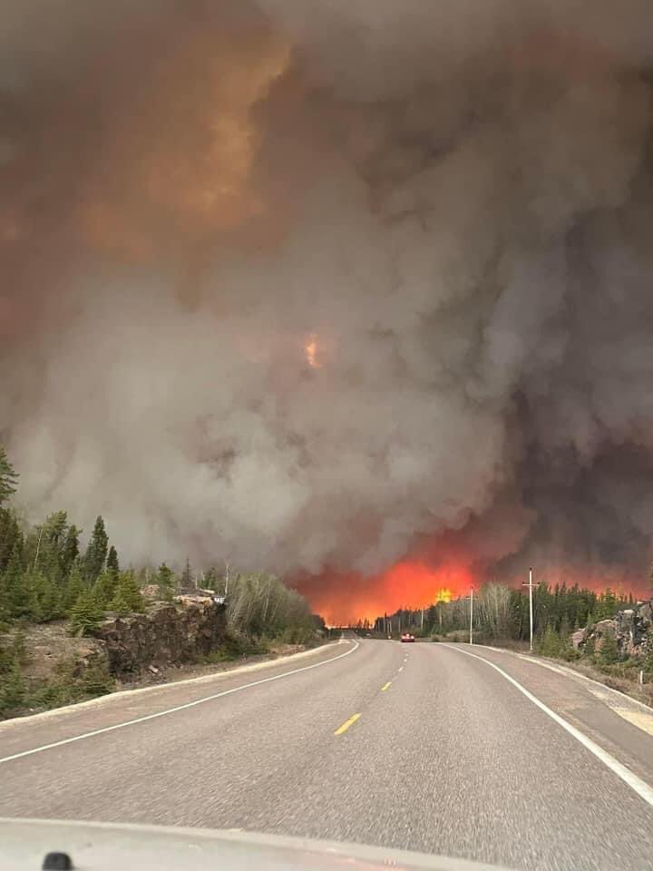 Lot of confusion right now with the #forestfire Cranberry Portage #Manitoba is being evacuated. This photo is Highway 10 north of Cranberry Portage, and has been closed between there and Flin Flon.