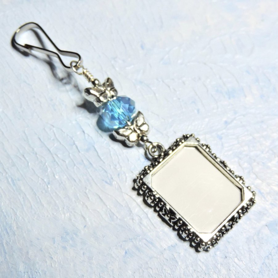 Wedding bouquet photo charm with a small picture frame, butterflies and a crystal. Gift for her! smilingbluedog.etsy.com/listing/593005… via @Etsy #Etsy #etsyseller #epiconetsy #etsymntt #bestofetsy #bride #bridetobe #etsyfinds #wedding #shopping #shoppingonline #gifts #butterflies #blue