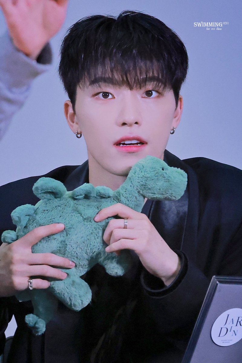 they have him posing with a stegosaurus plush... it may not be the apatosaurus but its another iconic herbivore