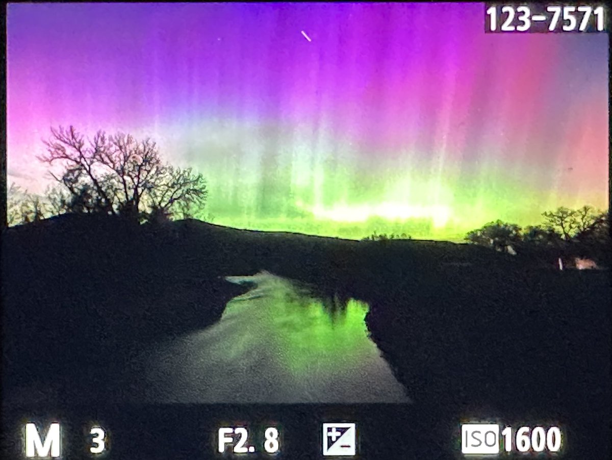 Vivid aurora pillars to the zenith right now in northern WY!