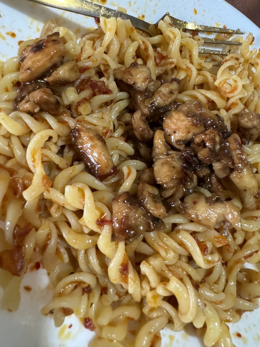 lunch menu experiment with butter chilli garlic pasta topped with marinated herbs soy sauce chicken 😋