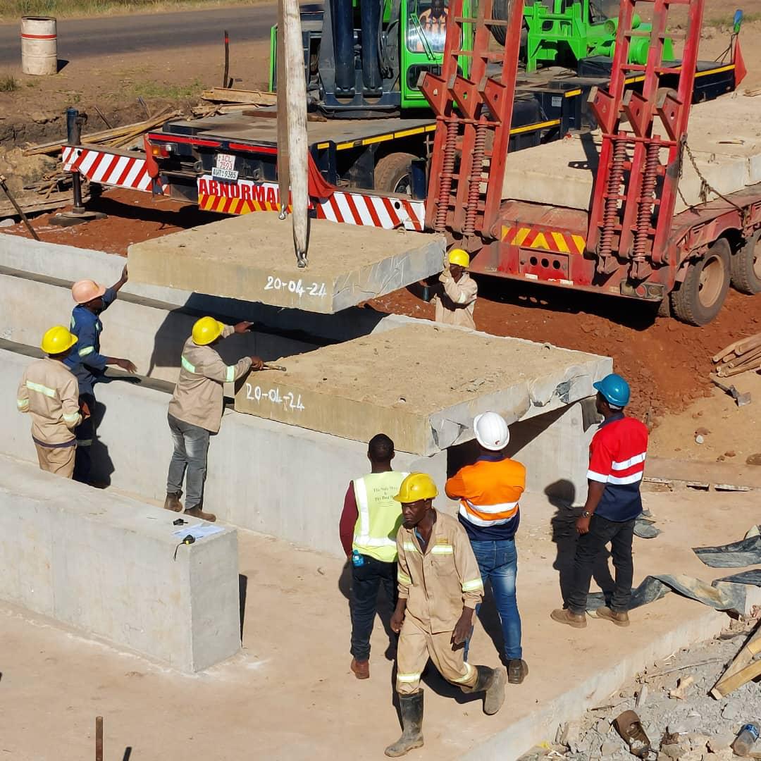 'Progress update! Installation of precast deck panels for the box culverts on Harare-Mazowe road dualisation. This milestone marks a significant step forward in enhancing the road network and improving travel experiences. #RoadDevelopment #InfrastructureMatters #Vision2030