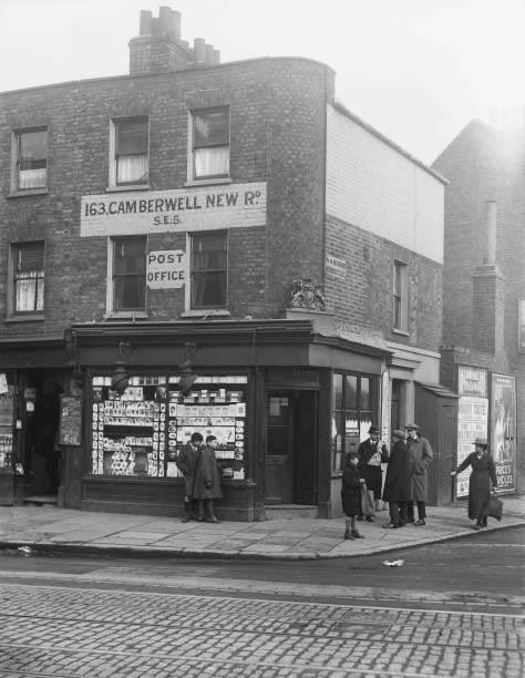 A photograph of Camberwell New Road, at the junction with Warham Street, in Camberwell, taken in 1920.