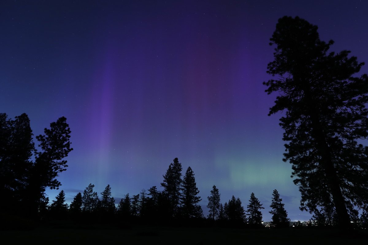 Momentary aurora borealis before it disappeared early tonight, Saturday, May 11, 2024, in Spokane, Wash.