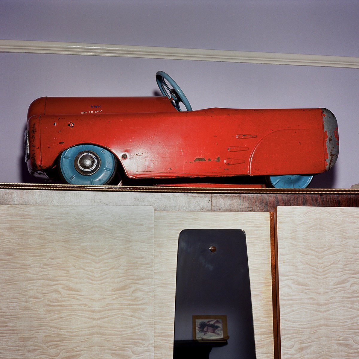 Barbara’s House. 

The scanning and editing is finished now. 

Thank you for your comments, ideas and support with this project. 

One last image, for now, of the red tin car her children rode around the garden. 

#WindrushGeneration 

Photo: Paul Halliday
