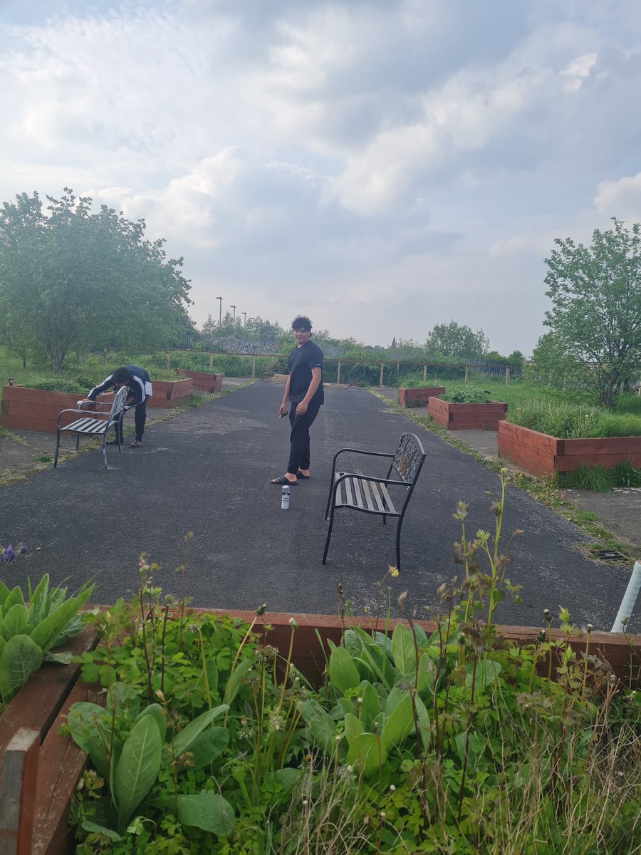 Clean-up of the #community garden has begun, repairing some rusty benches for the residents by two young volunteers. Looking for #flower #donations . #TeamBradford #Bradford  can you help?