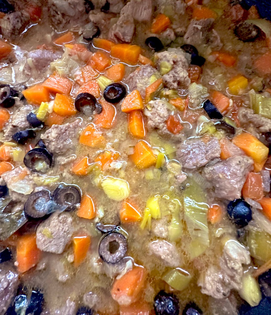 Slow cooked lamb w leek, black olive, carrot and orange zest. Cucina di Gemma/Gabby/Jamal