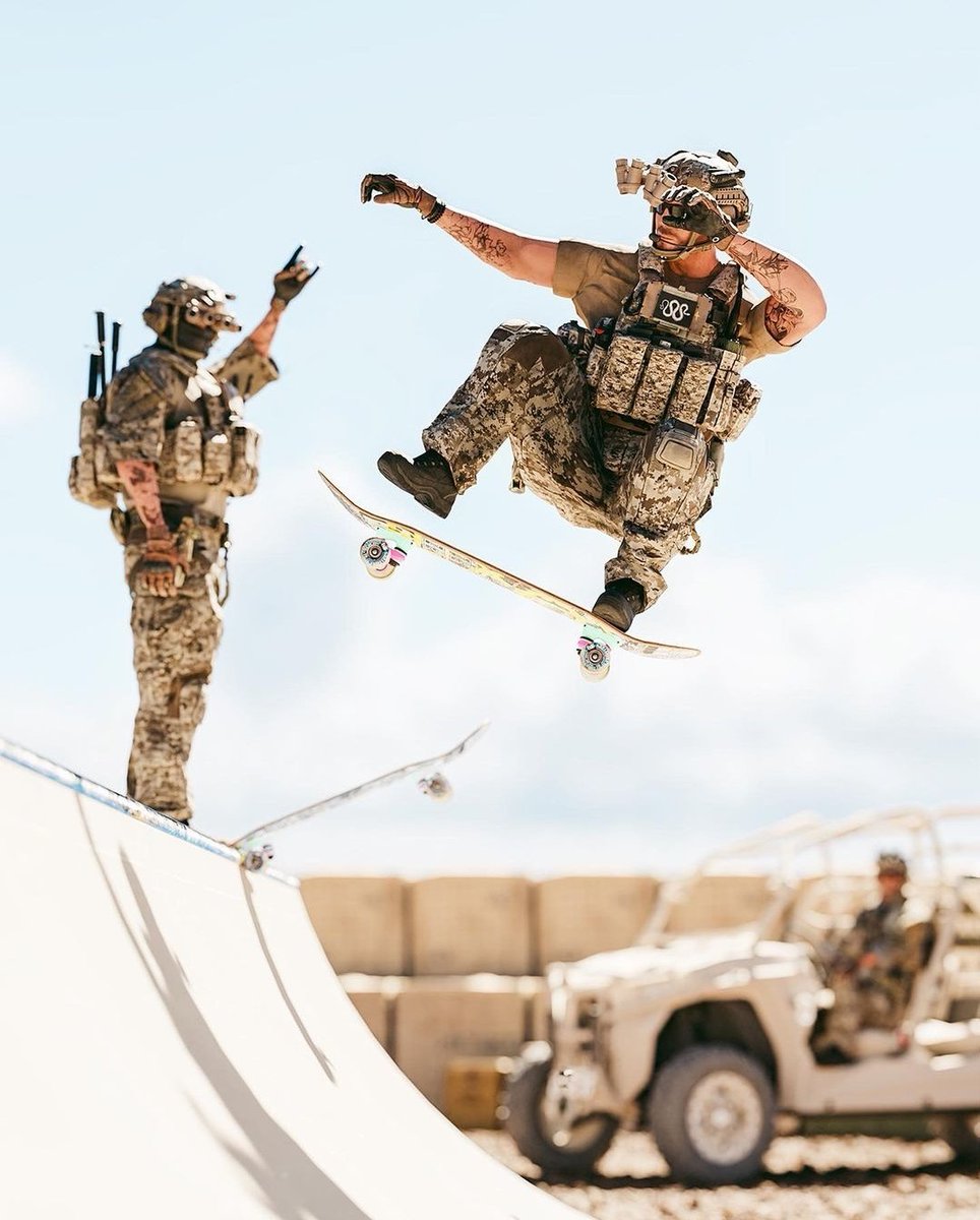 Photo of the Day: Super Army Soldiers (Sgt Don Atella and LCpl Lee Onardo) from the Skateboard Hostile Infantry Team demonstrating the new Trailblazer Wheeled And Tactical Surfboard environmentally friendly transport system. Photographed from a Canberra