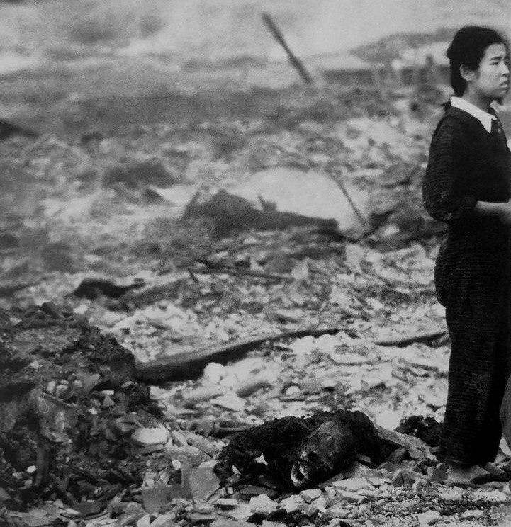 Chieko Ryu, 16, stands next to the charred remains of her mother, who was killed in an atomic bomb explosion. Nagasaki, Empire of Japan, August 1945. 

#Nagasaki1945 #AtomicBombing #WWIIHistory #NeverForget #NuclearTragedy #HistoricalAtrocity #ChiekoRyu
