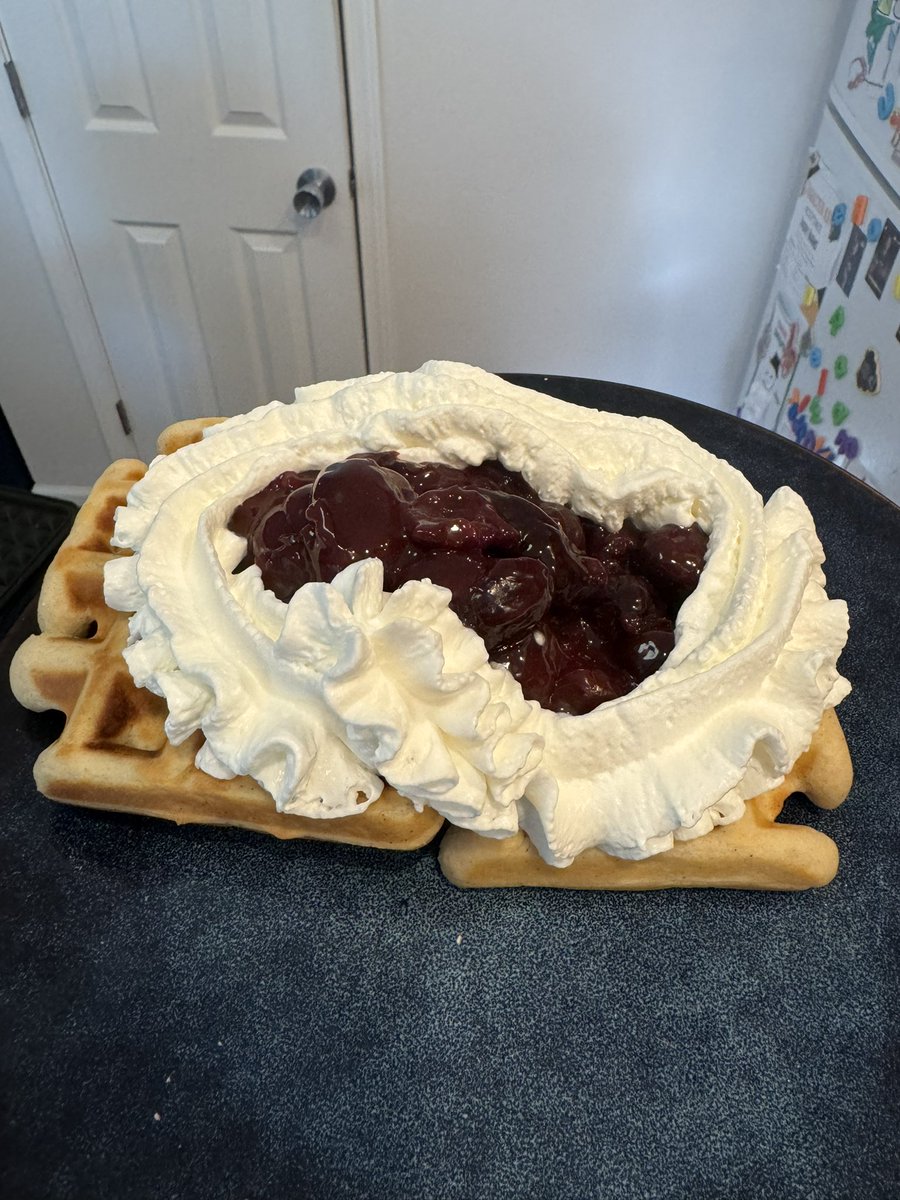 Good morning! Feeling a bit better, finally, this morning and made my wife waffles with homemade cinnamon cherry compote and whipped cream. Happy Mother’s Day to all the mothers!