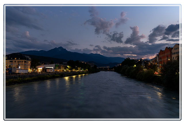 The #river #Inn, which gives its name to the #city of #innsbruck is a #beautiful view from one of the many #bridges that span the #water. This was shot in the #evening with the #moon over the water. #nightphotography #night #photography. For more, visit our #website or #follow