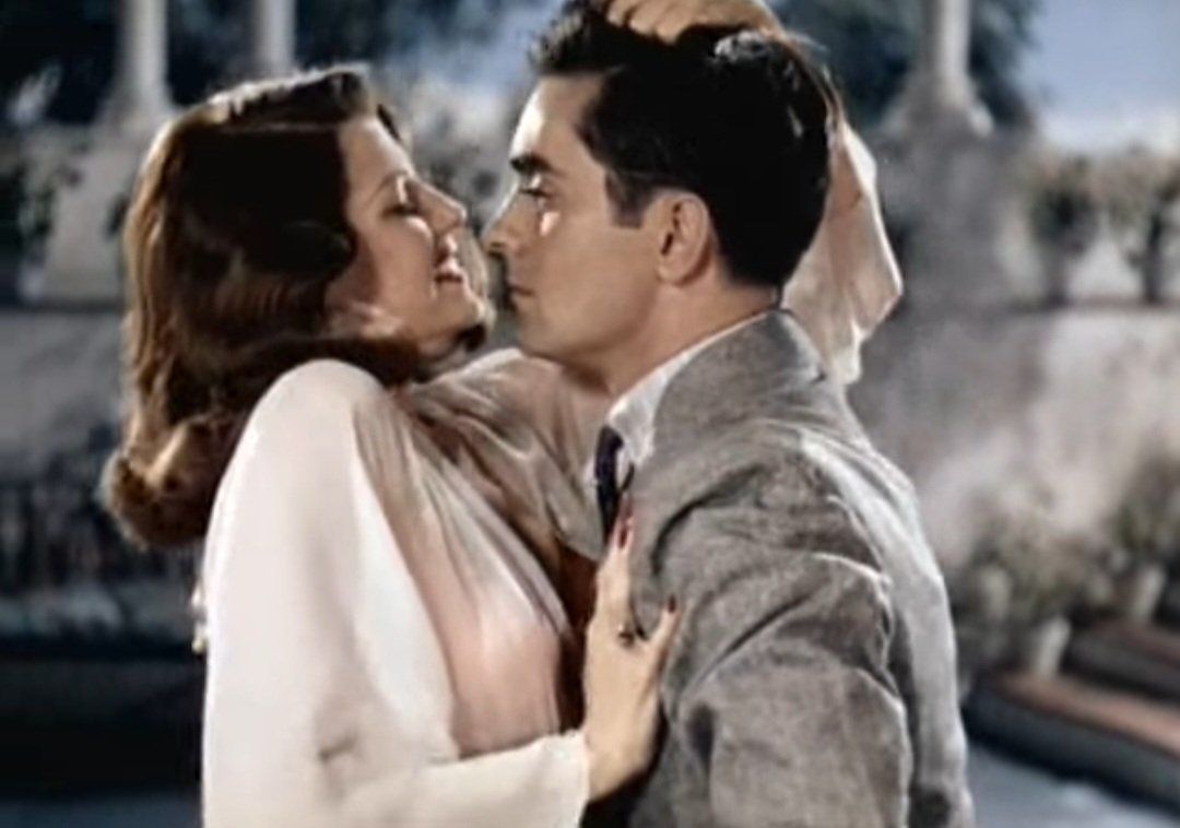 The way she grabs his hair and picks him up, no one's like Rita Hayworth.