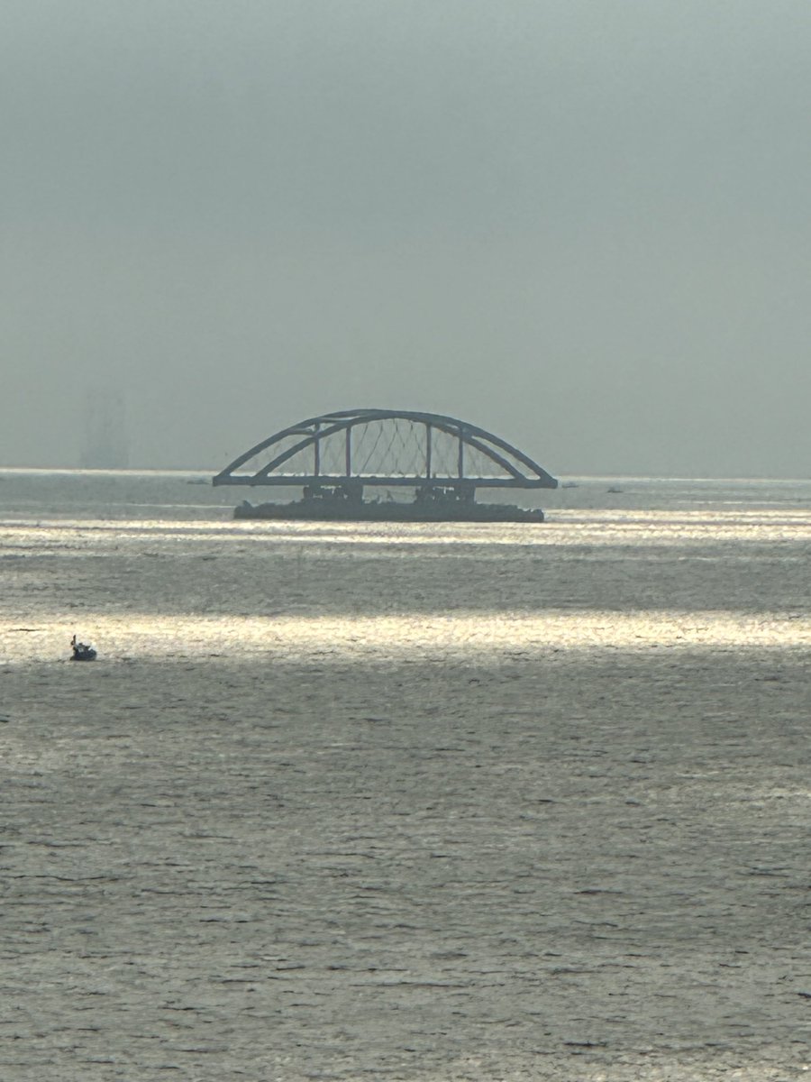 The next half of Mumbai’s iconic bow bridge travelling past my window to be connected to the sea link.