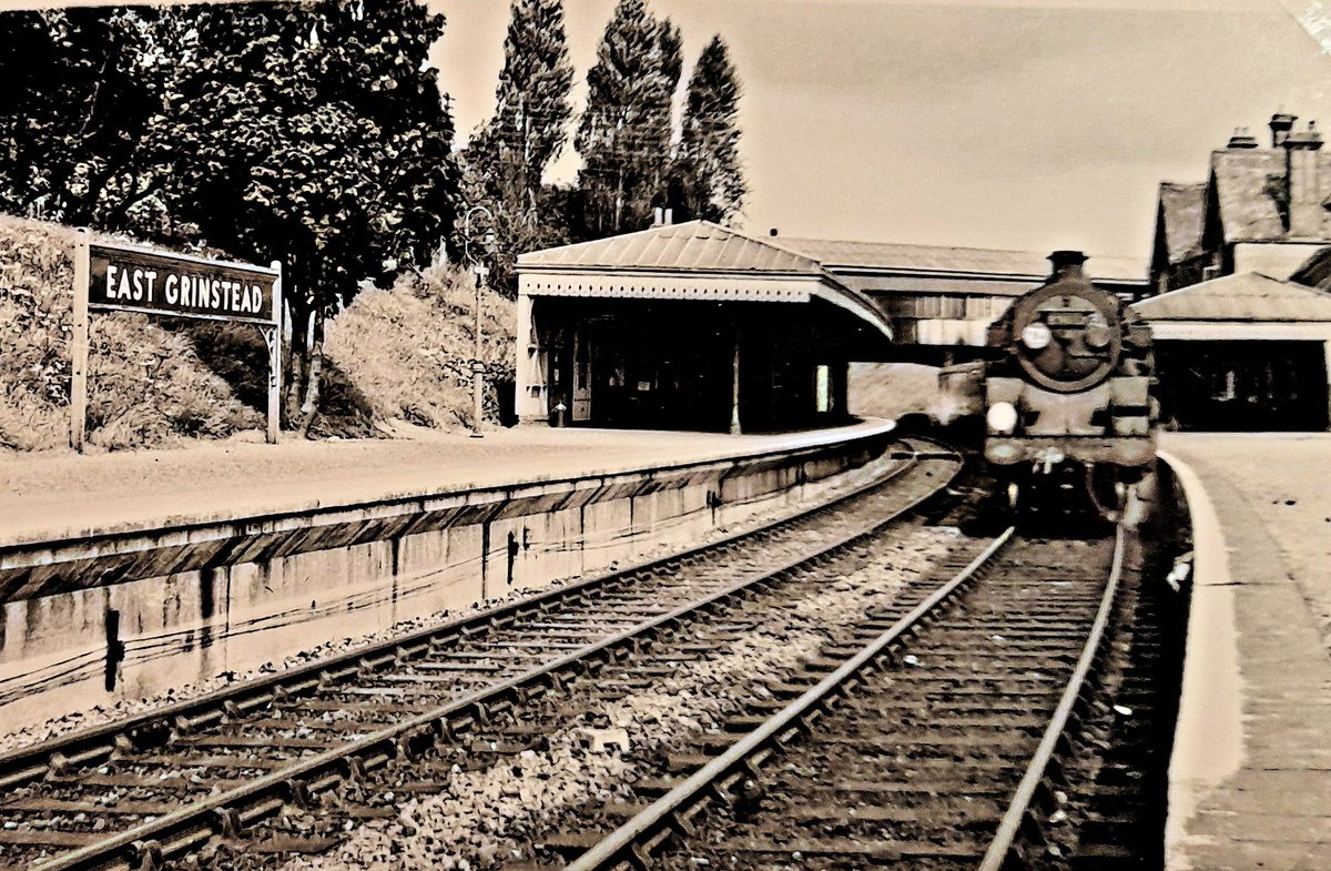An archive photo from the days when one could hop on a train at East Grinstead, and hop off at Brighton, Lewes or Tunbridge Wells etc. No date, but I should think it's mid/late 1950s. Note the high level station crossing the low level and the original Victorian station building.