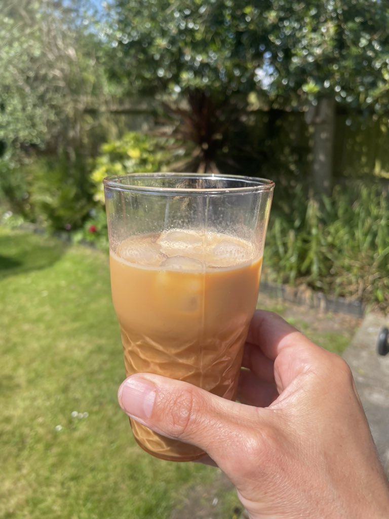 First home-made iced coffee of the season being imbibed in the garden. Double shot of espresso, milk, ice, a drop of maple syrup… sunshine, and bliss.