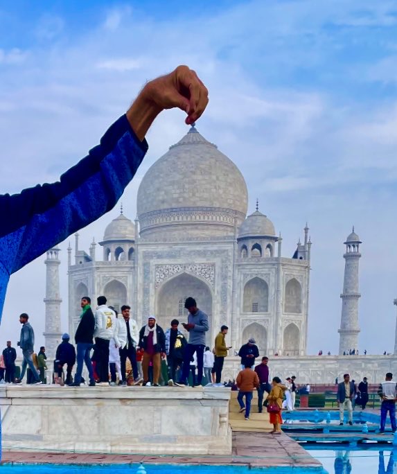 'Tour Guides' will sometimes relate exotic, but false, stories about historical sites. These stories are amusing but not substantiated by official documents. But the guides are clever with cell phone cameras. Image: Taj Mahal - 2024.