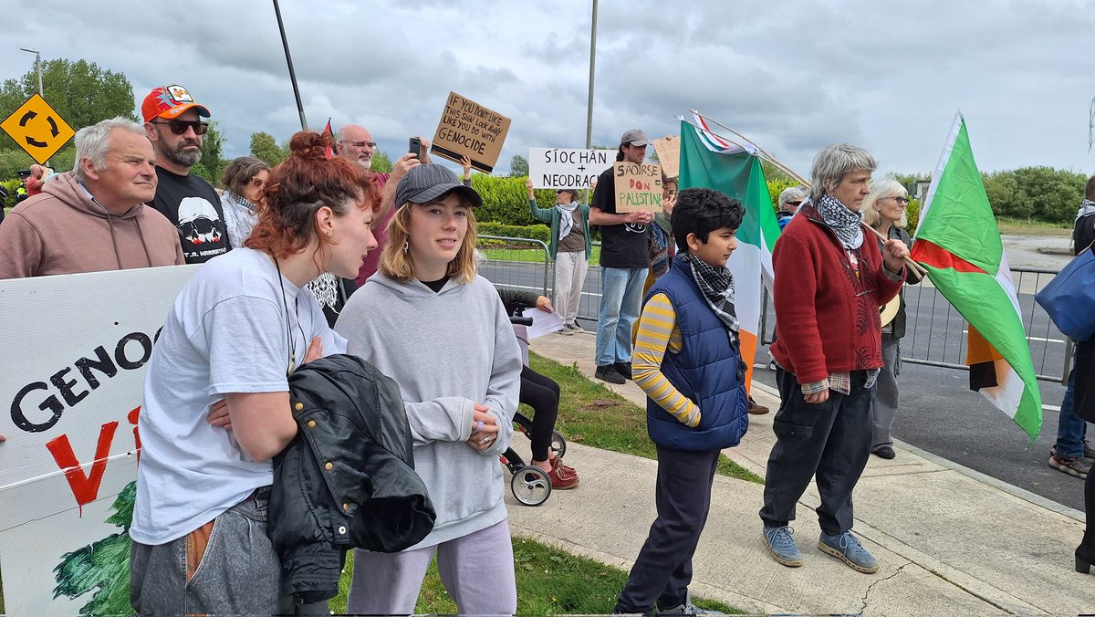 Shannon today. Reading the names of people shamefully murdered in Gaza. By Israel, using US weapons. As we gathered to remember them, a US military plane sat on the tarmac at Shannon Airport. Coming from Tel Aviv. Ireland is complicit. #USMilitaryOutOfShannon