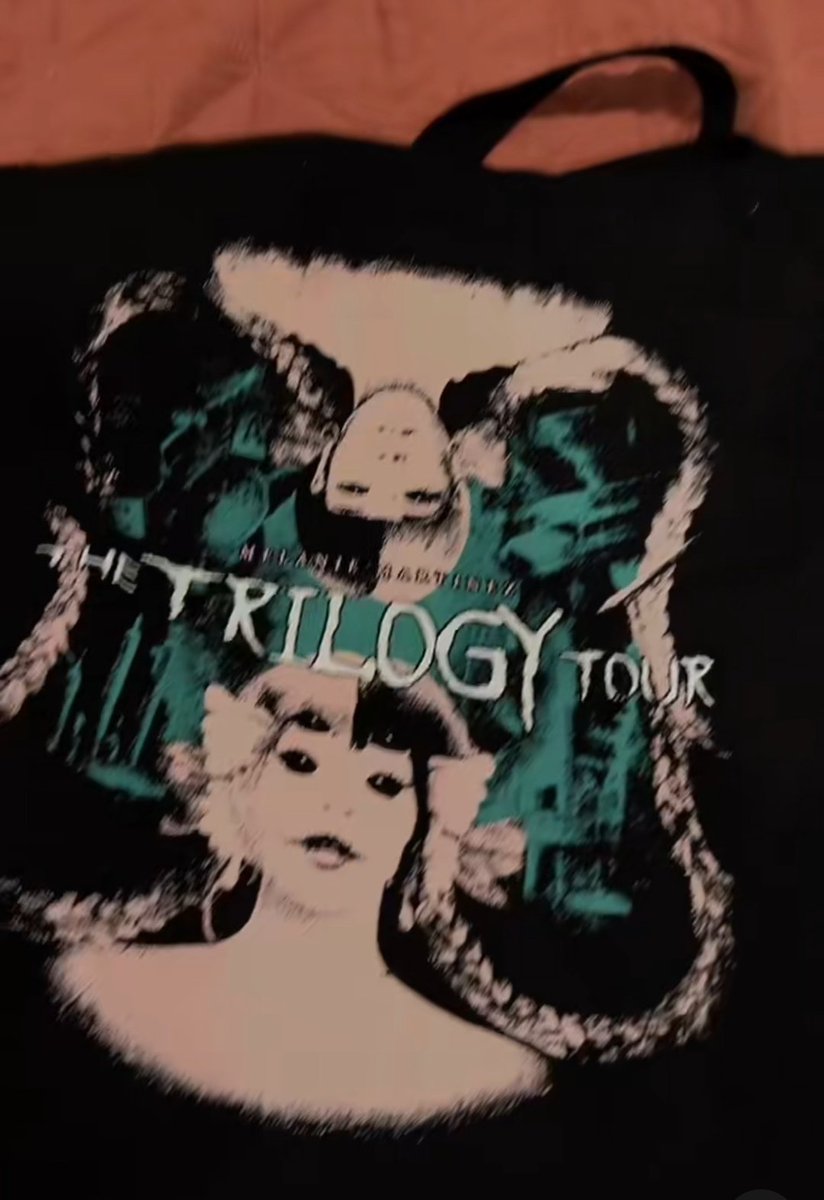Better look at the black tote bag available to purchase for $30 at “The Trilogy Tour” merch stands. 🍄

📸: crybabyarchive on TikTok
