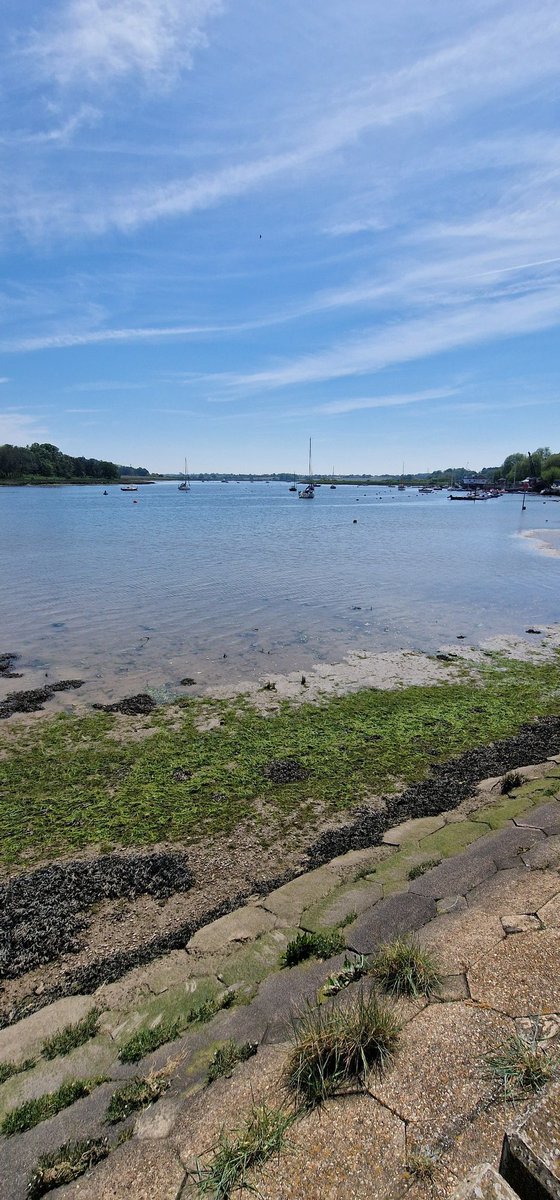 Warm Sunday May afternoon walk enjoying the weather and scenery in Woodbridge Suffolk