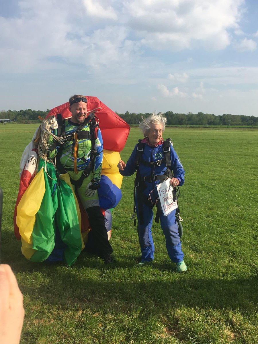 A jubilant Lelia Doolan (90) after her successful parachute jump. What a woman! #peacetakesbrains