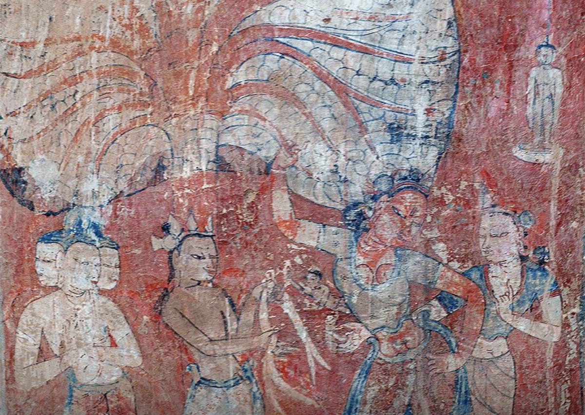 Queen Māyādevī delivering Siddhārtha, the infant Buddha. Brahmā with three heads next to Indra receiving the Buddha with Mahāpajāpatī Gotamī in assistance next to her sister. Mural at the 10th century Tholing monastery, Tibet.