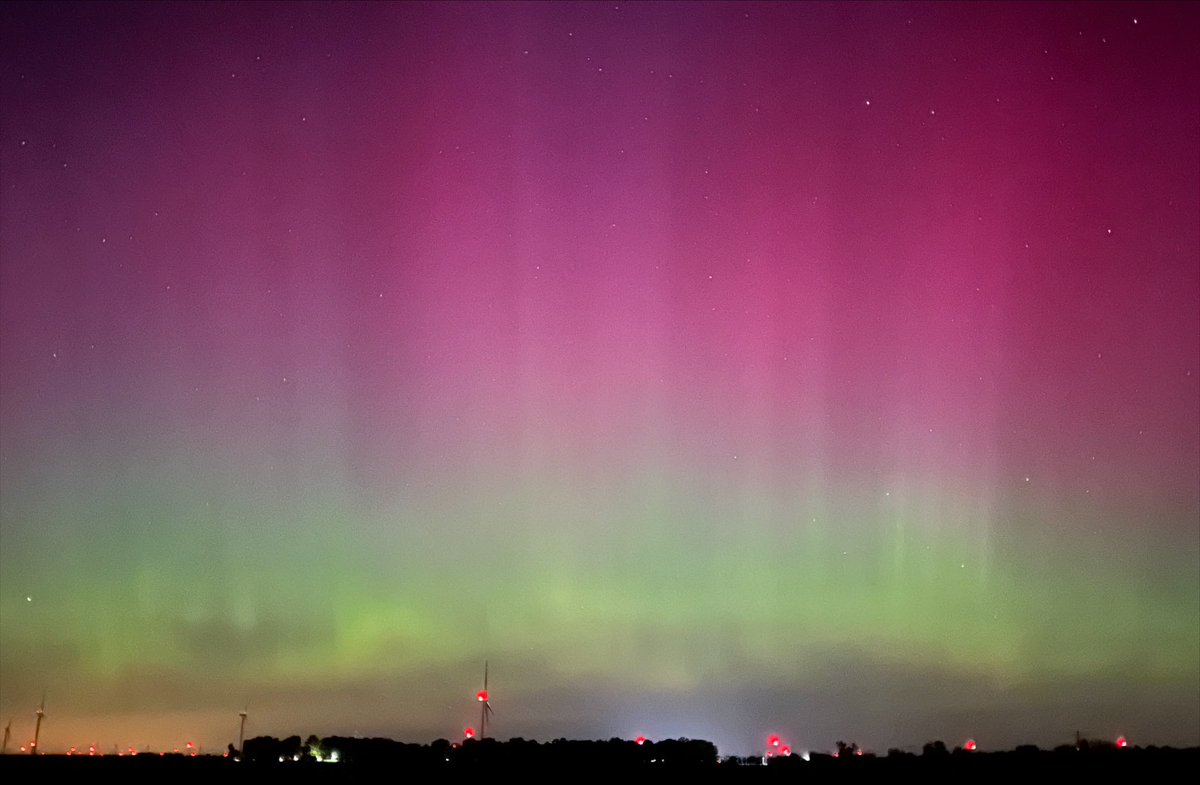 astro_dan_mil's tweet photo. The geomagnetic storm rages on! Hours after I gave up, @PurduePhysAstro graduates @dylancaudill20 and M. Aguilar captured these gorgeous photos of Mother Nature dressed in vibrant colors of the #aurora in the early hours of Mother’s Day, between cornfields of Brookston, IN. https://t.co/jOXqGPcXK8