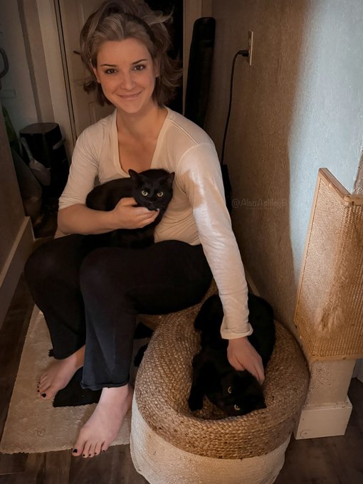 When you find your nonbinary lesbian aunt playing with your cats at 3am while you head to get water from
