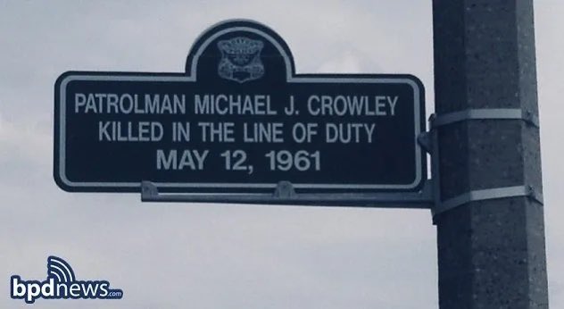 To honor the heroism of Officer Michael Crowley, a Hero Sign is posted on River Street in Mattapan to forever commemorate the memory of a man who gave his life in service to his city on May 12, 1961. 63-years later, we renew our promise and pledge to never forget him.