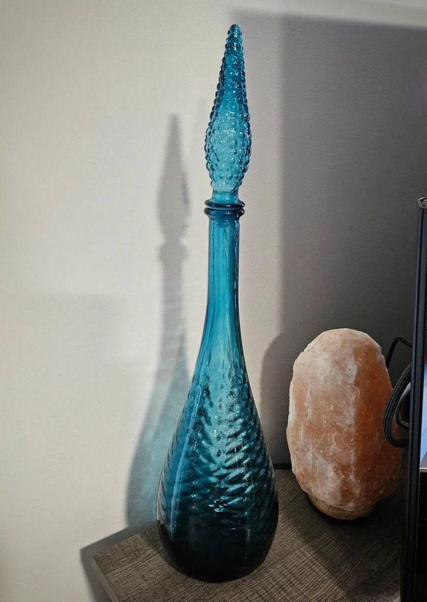 Vintage Empoli glass genie bottle, stands '22 H #vintageglass #geniebottle #saskatoonvintage #shopsaskatoon #yxelocal #nu2utreasureavailable $150. Located in Hampton Village Saskatoon Pm to claim or for shipping.