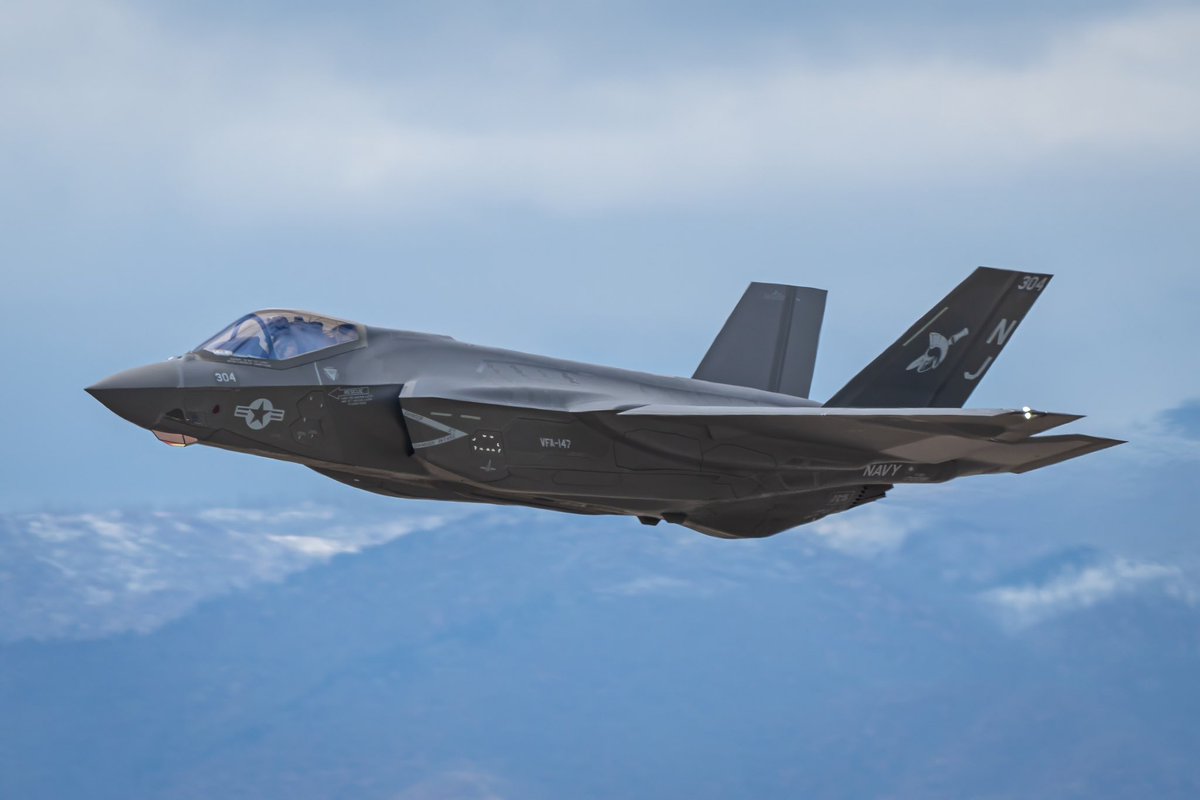 An F35C from Strike Fighter Squadron 147 (VFA147) Argonauts departs Peterson SFB on their way to NAS Lemoore.
