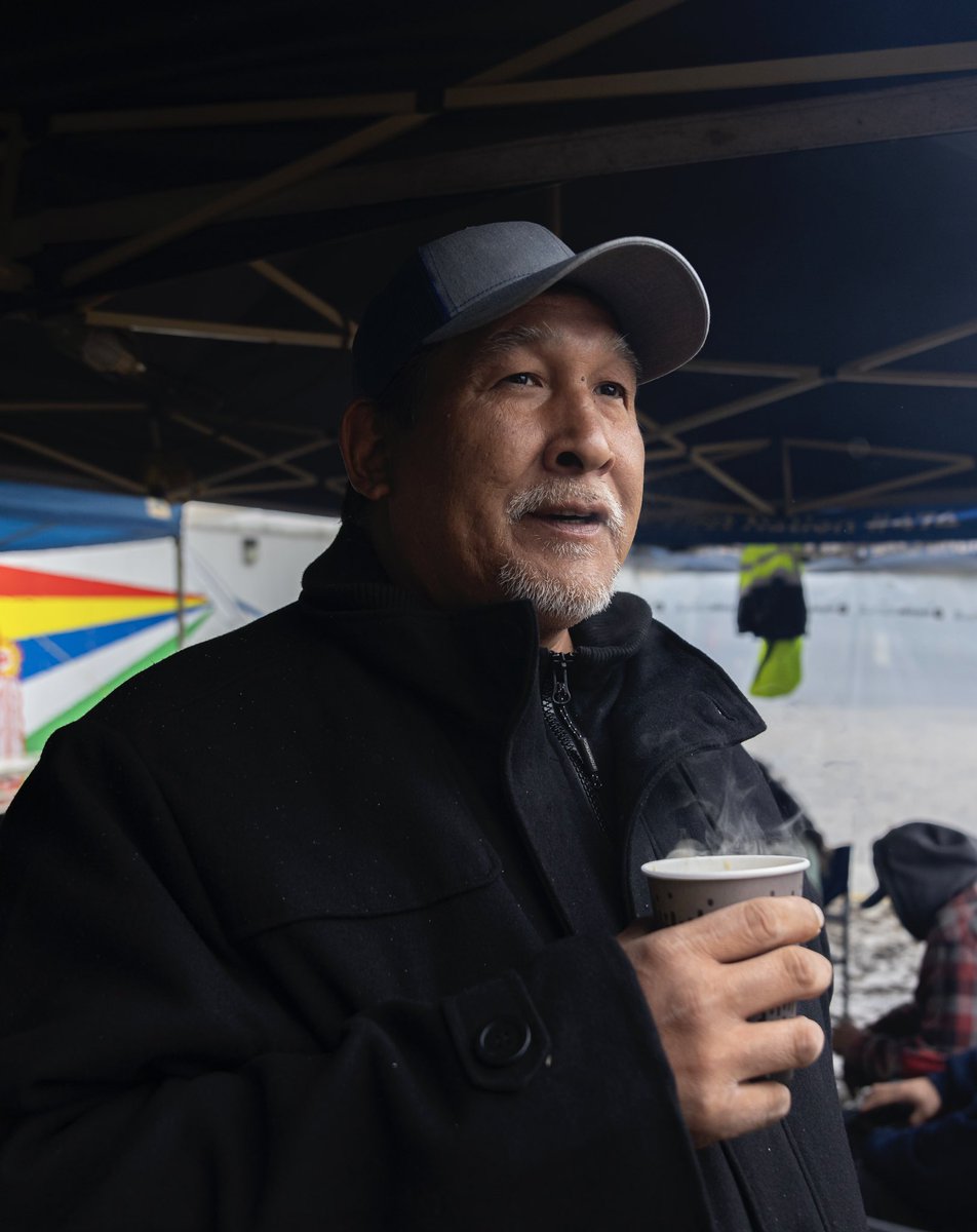 Woodland Cree First Nation Councillor Joseph Whitehead Jr.  Ponders over a warm cup of coffee on a cold wet day at the Traditional Camp on the Walrus Road near Peace River, AB 
#IndigenousRights #WCFN #Obsidian #OilandGas