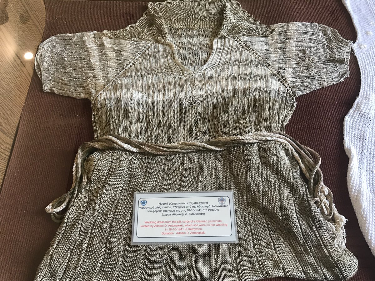 OTD 1941 German paratroopers dropped into Crete in the first mostly airborne invasion. In a break from the predictable here's a photo I took of a dress made from parachute cord & worn by Adriani D. Antonakaki on her wedding day in Rethymno (Oct 1941). Maritime Museum, Chania.